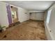The living room offers natural light from a window and includes a subfloor at 1317 Venetia St, Nokomis, FL 34275