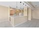 Bright kitchen featuring an eat-in breakfast bar, pendant lighting, and modern appliances, perfect for casual dining at 1363 New Forest Ln, Osprey, FL 34229