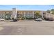 Attractive building exterior, featuring parking, sidewalks, landscaping and building number at 175 Kings Hwy # 428 B8, Punta Gorda, FL 33983