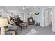 An open-concept living room includes access to the dining room and kitchen at 175 Kings Hwy # 428 B8, Punta Gorda, FL 33983