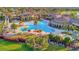 Beautiful aerial view of a resort-style pool and amenity center in a vibrant community at 20228 Lagente Cir, Venice, FL 34293