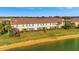 Beautiful view of the home's exterior, showcasing its well-maintained landscaping at 20228 Lagente Cir, Venice, FL 34293