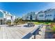 Beautiful community area featuring picnic tables, benches, and barbecue grills perfect for outdoor gatherings at 2340 Lindstrom St, Sarasota, FL 34237