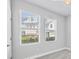 Light-filled bedroom with large windows offering exterior views and creating a serene, airy atmosphere at 2340 Lindstrom St, Sarasota, FL 34237