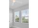 Light-filled bedroom with large windows offering exterior views and creating a serene, airy atmosphere at 2340 Lindstrom St, Sarasota, FL 34237