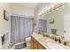 Bathroom features granite countertops, vanity, and shower-tub combination at 2611 221St E St, Bradenton, FL 34211