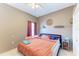 Cozy bedroom featuring a twin bed and plenty of natural light at 2611 221St E St, Bradenton, FL 34211