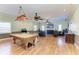 Spacious recreation room with a pool table, ample seating, and a large TV for entertainment at 2611 221St E St, Bradenton, FL 34211