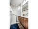 Bathroom features a modern vanity and a glass shower with a chrome handle at 3130 Key Way, Sarasota, FL 34239