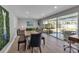 Dining room with an exterior view, decorative wall art and neutral decor at 3130 Key Way, Sarasota, FL 34239