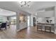 Open layout of a modern dining and kitchen area with lovely views of the backyard patio at 3130 Key Way, Sarasota, FL 34239