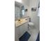 Bathroom featuring a cream-colored sink and a nautical-themed shower curtain at 3333 26Th E Ave # 1257, Bradenton, FL 34208