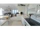 Open kitchen with an adjacent dining and living area, providing a comfortable and functional living space at 3333 26Th E Ave # 1257, Bradenton, FL 34208