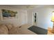 Bright living room features neutral walls, carpet, and a comfortable sofa with beachy accents at 3333 26Th E Ave # 1257, Bradenton, FL 34208