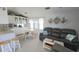 Open-concept living space features an adjacent kitchen and dining area, perfect for entertaining at 3333 26Th E Ave # 1257, Bradenton, FL 34208