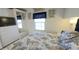 Main bedroom boasts built-in storage, a large window, and a comfortable layout at 3333 26Th E Ave # 1257, Bradenton, FL 34208