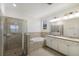 Spacious bathroom with soaking tub, walk-in shower, and double vanity at 3512 Scrub Creek Run, Lakewood Ranch, FL 34211
