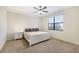 Bright bedroom with carpet and a large window provides natural light at 3512 Scrub Creek Run, Lakewood Ranch, FL 34211