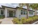 Exterior of the fitness center with palm trees and landscaping at 3522 Ferndell, Sarasota, FL 34235