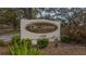 Entrance sign for The Meadows Country Club, showcasing the community's brand and inviting atmosphere at 3522 Ferndell, Sarasota, FL 34235