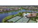Community amenities include an outdoor pool, tennis courts and a lake, enhancing the living experience in a desirable neighborhood at 358 River Enclave Ct, Bradenton, FL 34212