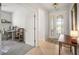 Bright entryway featuring decorative glass door and adjacent office space, great for welcoming guests and working from home at 358 River Enclave Ct, Bradenton, FL 34212