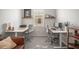 Bright home office featuring dual desks and a sunny window, perfect for productivity and comfortable work environment at 358 River Enclave Ct, Bradenton, FL 34212