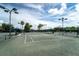 Community tennis courts with covered seating and lighting at 358 River Enclave Ct, Bradenton, FL 34212