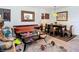 A living room decorated with a rug, coffee table, couch, and dining table at 3602 Beneva Rd # 405, Sarasota, FL 34239