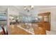 Open dining area provides ample room for dining with seamless view to the sunroom and kitchen at 4131 Salernes Ave # 3051, Sarasota, FL 34233