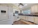 Bright kitchen with sleek granite counters, appliances, and ample cabinet space, a chef's delight at 4131 Salernes Ave # 3051, Sarasota, FL 34233