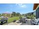 Outdoor patio overlooking a serene pond, perfect for relaxing or entertaining guests at 4131 Salernes Ave # 3051, Sarasota, FL 34233