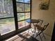 Outdoor lanai with seating area and a view of backyard at 425 30Th W Ave # C104, Bradenton, FL 34205