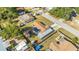Aerial view of home showing long drive, carport and sheds at 432 Crosby Ct, Sarasota, FL 34237
