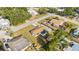 A sunny aerial view of the home and the surrounding community at 432 Crosby Ct, Sarasota, FL 34237