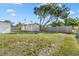 Spacious backyard featuring a shed and a wooden fence at 432 Crosby Ct, Sarasota, FL 34237