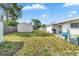Spacious backyard featuring a shed and ample green space at 432 Crosby Ct, Sarasota, FL 34237