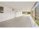 Long carport attached to the home, offering covered parking at 432 Crosby Ct, Sarasota, FL 34237
