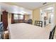 Inviting dining area with tile floors, adjacent to the living room and kitchen for easy access at 432 Crosby Ct, Sarasota, FL 34237