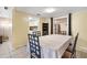 Bright dining room featuring tile floors and an open layout, perfect for entertaining guests at 432 Crosby Ct, Sarasota, FL 34237