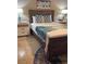 Nicely decorated bedroom with a queen-size bed, two nightstands, and natural light at 4510 El Conquistador Pkwy # 105, Bradenton, FL 34210