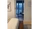 Bedroom view looking into waterfront office with large windows at 4510 El Conquistador Pkwy # 105, Bradenton, FL 34210