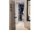 Walk-in closet with ample storage, custom shelving, and a modern design at 4510 El Conquistador Pkwy # 105, Bradenton, FL 34210