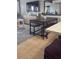 Modern living room with dining area, television, and comfortable seating at 4510 El Conquistador Pkwy # 105, Bradenton, FL 34210