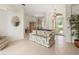 Bright and airy living space showcasing an open floor plan with tiled floors and elegant furnishings at 4613 Sweetmeadow Cir, Sarasota, FL 34238