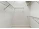 Walk-in closet with wire shelving providing ample storage space at 4613 Sweetmeadow Cir, Sarasota, FL 34238
