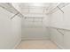 Walk-in closet with wire shelving providing ample storage space at 4613 Sweetmeadow Cir, Sarasota, FL 34238