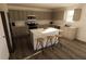 Modern kitchen featuring a large island with seating and stainless steel appliances at 4618 Hawthorn Ave, Parrish, FL 34219
