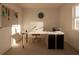 Bright home office with a large desk and ample natural light at 4618 Hawthorn Ave, Parrish, FL 34219