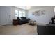 Cozy living room filled with natural light, modern decor, and bright flooring at 466 Sunnyside Dr, Venice, FL 34293